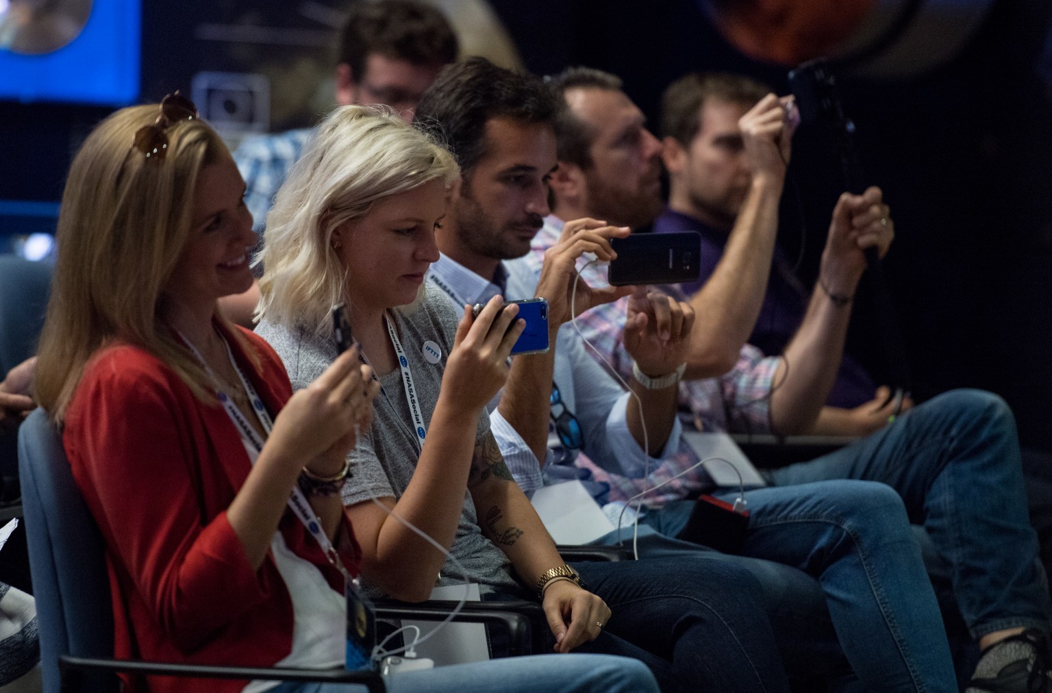 NASA Social attendees are seen during a science panel discussion with Cassini project scientist at JPL, Linda Spilker, Cassini interdisciplinary Titan scientist at Cornell University, Jonathan Lunine, Cassini Composite Infrared Spectrometer(CIRS) Instrument deputy principle investigator Connor Nixon, and Cassini assistant project science systems engineer Morgan Cable, Thursday, Sept. 14, 2017 at NASA's Jet Propulsion Laboratory in Pasadena, California. Since its arrival in 2004, the Cassini-Huygens mission has been a discovery machine, revolutionizing our knowledge of the Saturn system and captivating us with data and images never before obtained with such detail and clarity. On Sept. 15, 2017, operators will deliberately plunge the spacecraft into Saturn, as Cassini gathered science until the end. The “plunge” ensures Saturn’s moons will remain pristine for future exploration. During Cassini’s final days, mission team members from all around the world gathered at NASA’s Jet Propulsion Laboratory, Pasadena, California, to celebrate the achievements of this historic mission. 