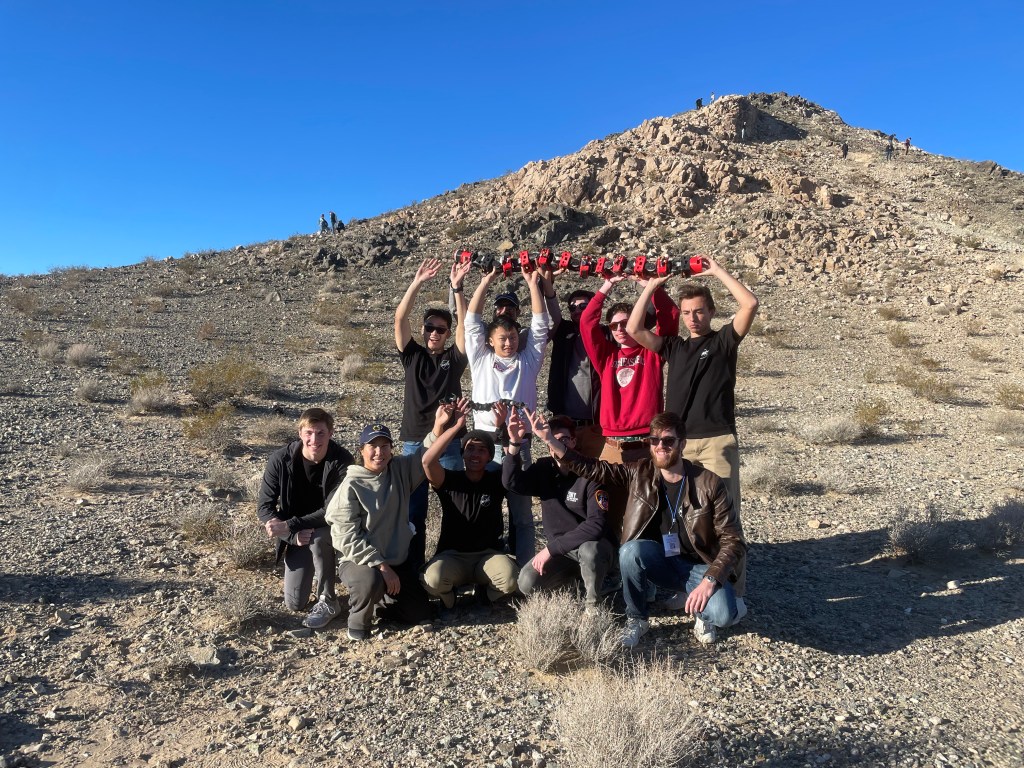 The Northeastern University team tests their COBRA: Crater Observing Bio-inspired Rolling Articulator rover in the desert during the BIG Idea Forum Nov. 14-17, 2022.