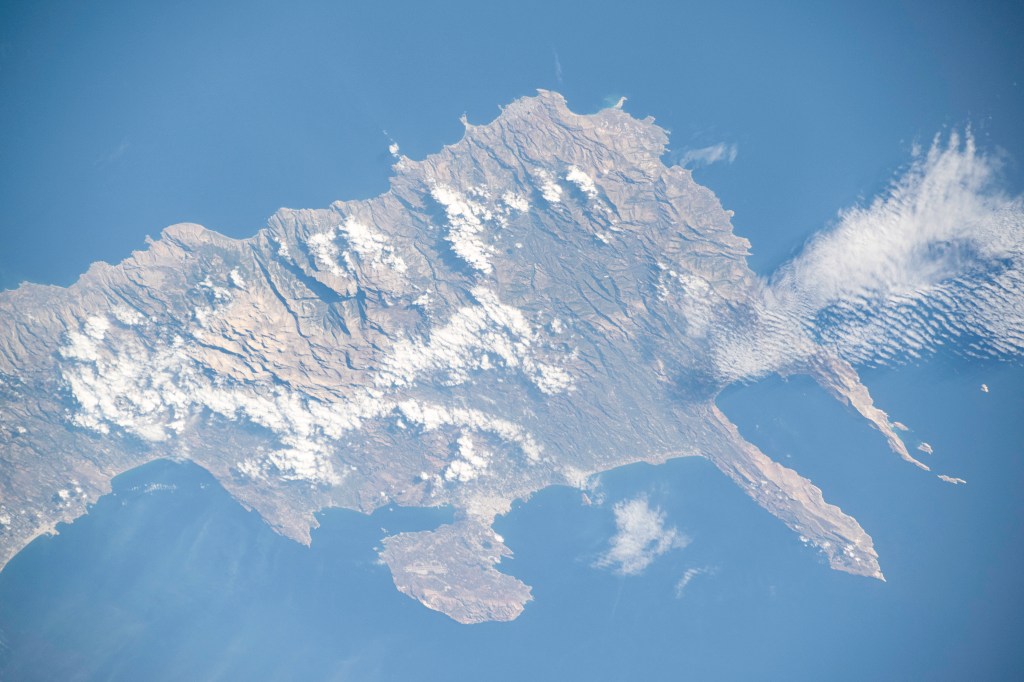 iss071e700011 (Sept. 19, 2024) -- The largest of the Greek islands, Crete, was photographed from the International Space Station as it orbited 258 miles above. The northwestern portion of the island is pictured here, including Chania, one of four regional units.