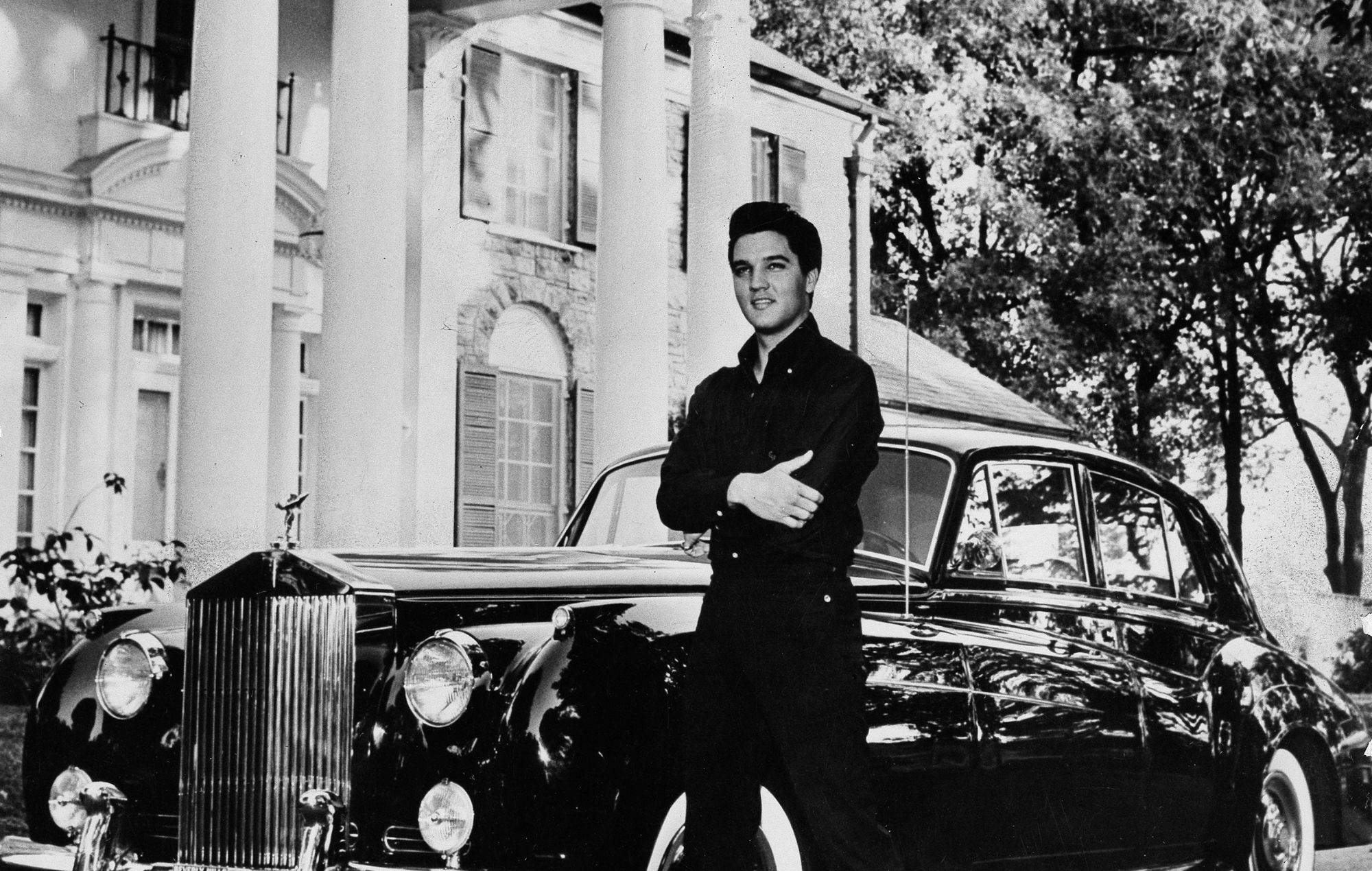 Elvis with Rolls Royce in front of his villa 'Graceland' in Memphis, Tennessee