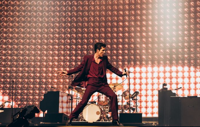 Brandon Flowers performing live on stage with The Killers in Las Vegas