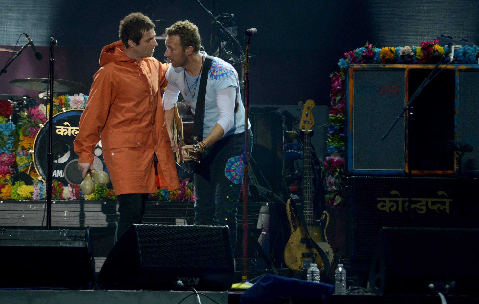 (L) Liam Gallagher and Chris Martin