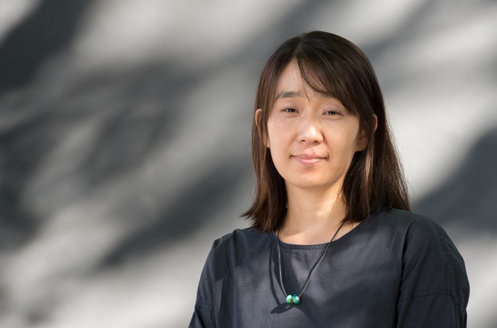 South Korean writer Han Kang attends a photocall at Edinburgh International Book Festival at Charlotte Square Gardens on August 17, 2016 in Edinburgh, Scotland.