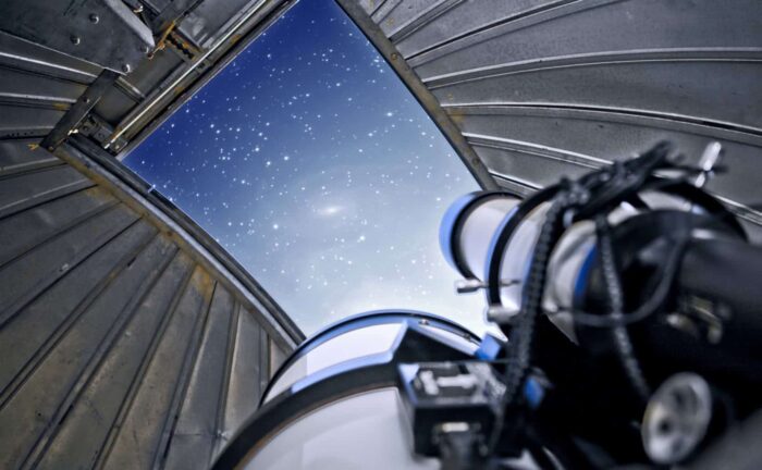 Image of telescope and stars.