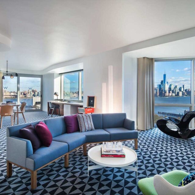 hotel suite overlooking river and New York City skyline